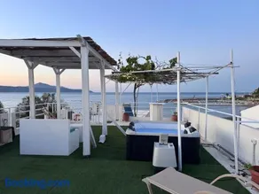Kyma Haven Beachfront with Rooftop Jacuzzi - Image 1