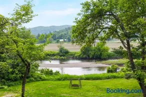 Designer A-Frame Treehouse with hot tub on river - Image 4