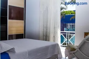 Apto a 70 metros da praia, Piscina, 03 Ar Condicionados, Vaga de Garagem - Image 4
