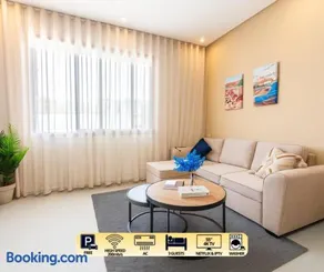 Boho Chic Apartment - Walk to Beach, Rooftop, Workspace, Free Parking & AC - Image 1