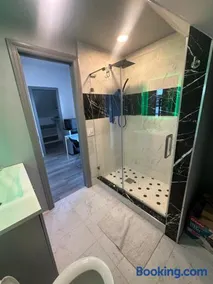 Luxury Master Bedroom with private bathroom walking distance to Sofi Stadium, KIA Forum and Intuit Dome also only train stop away from LAX airport Perfect place for tourists and event attendees - Image 4