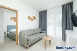 Aquamarina Dąbki - Apartamenty Blisko Morza by Noclegi Renters - Image 1