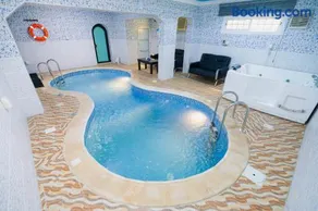 Downtown- Family Apartment 2-Bedroom with a Private Pool15-Minute Drive from Haramain Train - Image 1