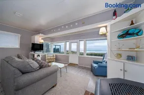 Steps to the Beach, Charming Oceanfront Bungalow with Deck and Ocean Views - Image 1