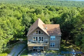 Pocono 6BR - Game Room, Hot Tub, Lake and Beach Access - Image 1