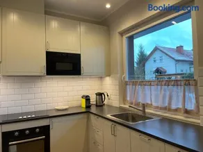 Modern terraced apartment with green garden - Image 3