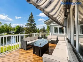 Canalside Summer Cottage with Waterview, Custom Bar, BBQ, and Fireplace - Image 5