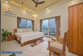 SaffronStays Zeel by the Lake - 4BR lakefront pool villa with gazebo, games room & stunning Bhavali Dam views - Image 3