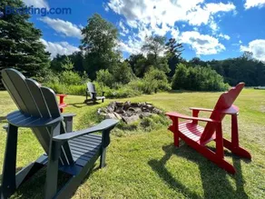 Relaxing Riverside Getaway with a Cozy Fireplace - Image 2