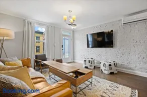 Charming 4BR with Private Patio and Historic Row Downtown - Image 3