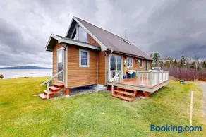 Cozy, dog-friendly waterfront cabin with large yard, porch, dock, & lake views - Image 2