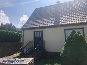 House next to a lake - Image 1