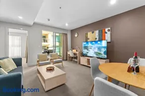 Ultima Escapes - Glenelg Beachfront Bliss - Direct Beach Access, Pool, Gym, Free Parking, Wi-Fi - Image 1