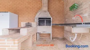 Casa em Ubatuba com churrasqueira e varanda ampla - Image 2