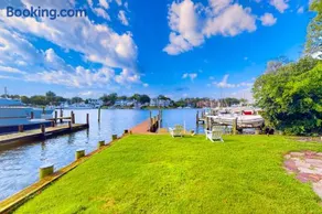 Dog-friendly riverfront home with dock, 2 balconies, waterside patio, & grill - Image 2