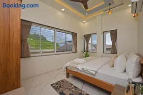 SaffronStays Zeel by the Lake - 4BR lakefront pool villa with gazebo, games room & stunning Bhavali Dam views - Image 5