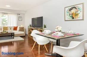 Cozy Modern 4BR Home with Sunny Patio - Image 1