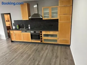 Gemütliche Ferienwohnung mit 1 Schlafzimmer, Wohnzimmer mit Schlafcouch & voll ausgestattete Küche - Image 1