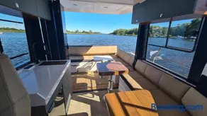 Luxury motor yacht with harbour view - Image 1