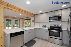 Lakefront Home with Boat Dock and Multiple Decks - Image 2