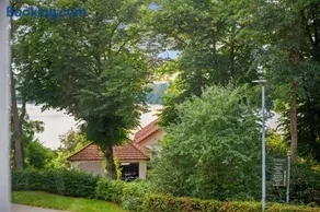 MAISUITES Sperling - Zentrale Ferienwohnung mit Boxspringbett, Kaffeevollautomat, WLAN & seitlichem Seeblick - Image 1