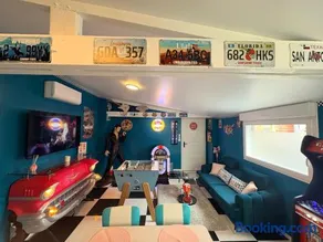 Suite Rétro Chic avec Spa en Terrasse - Image 2
