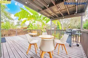 Inviting 3BR Home with Porch & Greenery - Image 2