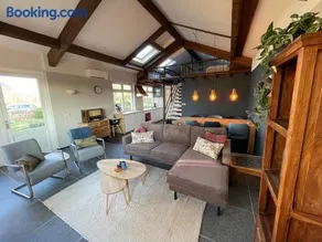 Wellness bungalow met privésauna en hot tub - Glamping aan de Maas - Image 3