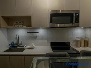Stylish New 1BR in Toronto with Fast WiFi and Private Workspace - Image 1