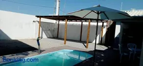 Casa com piscina e espaço gourmet a 30m da praia! - Image 5