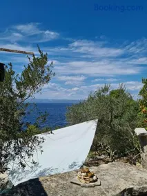 Cottage made of stones and wood with the sea view. - Image 1