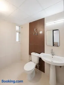 Family Friendly 2BHK - A1 Homestay At Crossings Republic - Image 2