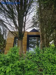 Ty Branwen- Luxury Woodland Lodge with Stunning Views - Image 5