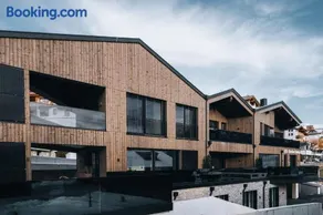 Bacher Living - Chalets & Apartments - Image 1