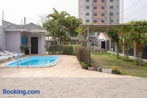Casa Completa com Piscina Churrasqueira Sinuca Wi-Fi e Garagem para 4 Carros a 350m da Praia Acomoda 12 Pessoas, 4 Quartos com Ar-Condicionado - Image 3