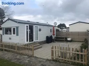 LUXE CHALET MIDDEN IN DE DUINEN 1 KM VAN STRAND. - Image 1
