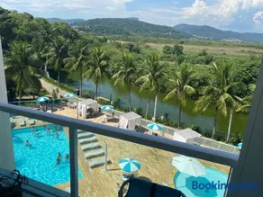 Apartamento com piscina a poucos passos da praia - Image 1