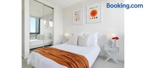 Waterfront 2-Bedroom Apartment with Pool, Gym & Free Parking - Image 2