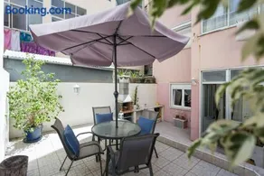 1-Bedroom Flat with Terrace, near Metro & Arena - Image 1