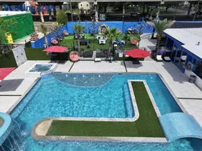 Blue Crawfish Boutique Hotel & Pool Bar - Image 1