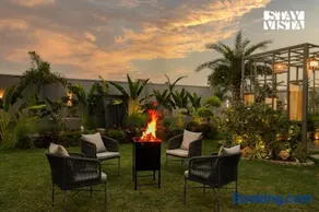 StayVista's The Palm Courtyard - 4BHK Villa with Bathtub & Alfresco Dining - Image 2