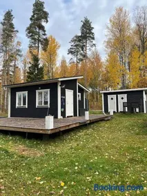 A simple stuga on a lake incinerating toilet in a separate building next to the cabin Water for drinking and washing hands dishes comes from two containers that attach to a faucet through a simple electric pump OBS no shower on site - Image 1