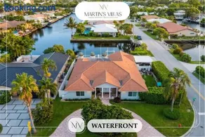Luxe 4BR Waterfront w Htd Pool 5min to beach - Image 1