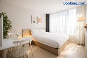 Value Stay Songdo 21층 호수뷰 루프탑수영장 호텔침구 스마트TV 공항30분 - Image 1