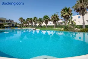 Aphrodite Beachfront Resort F202 - Shared Pool - Image 1
