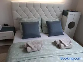 Zen Olive Guest Room - Image 2