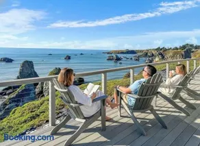 Seaside Elegance Oceanfront Escape with 3 Suites - Image 1