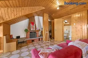 La Mansarda Sul Lago: Rustic Attic Studio with Balcony & Parking - Happy Rentals - Image 2