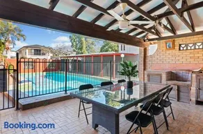 Sunny Stay 4BR with Pool in Prime Location - Image 4