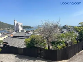 城跡石垣上の絶景古民家宿 鞆城茶屋庵 - Image 1
